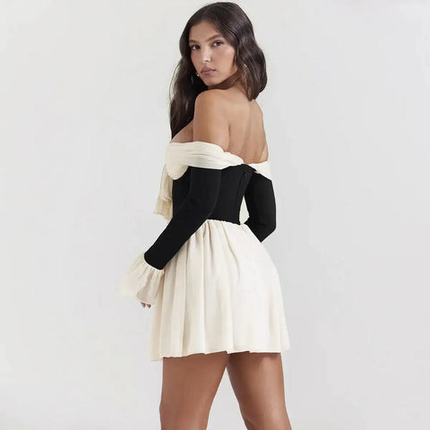 Image of Vestido mini sexi tiene un escote elegante con hombros descubiertos
